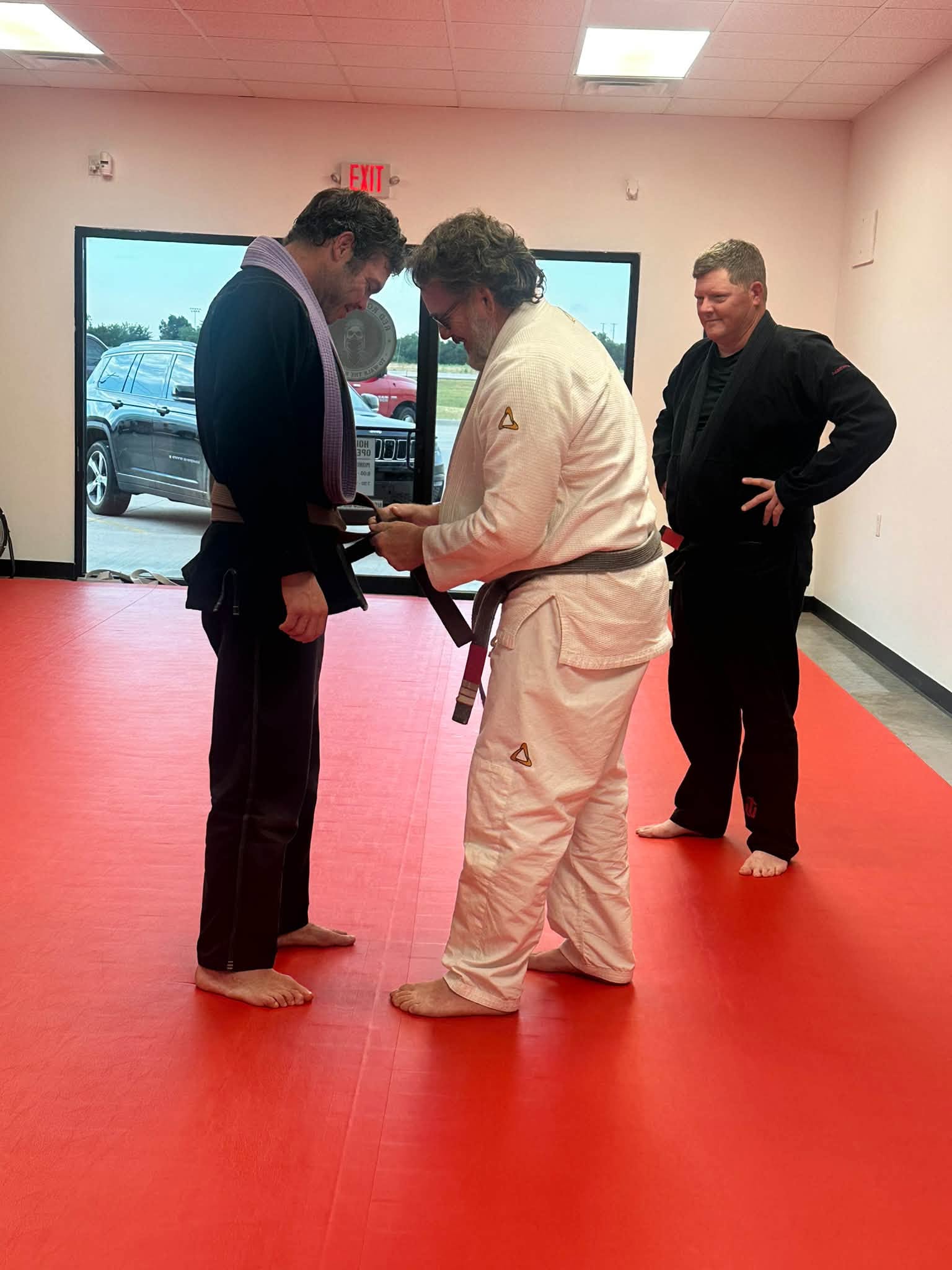 Red Road Jiu Jitsu belt promotion and coaching moment